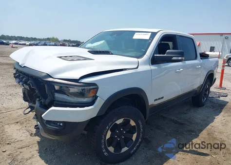 2021 Ram 1500 Rebel 4X4 5'7 Box from USA, damaged, VIN 1C6SRFLT0MN559314